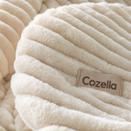 Close up of the ribbed pile texture with the Cozella label
