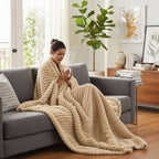 Cozella Ribbed Plush Throw in Camel on a living room sofa